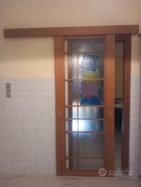 Porta in vetro scorrevole