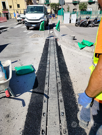 Operaio stradale escavatorista