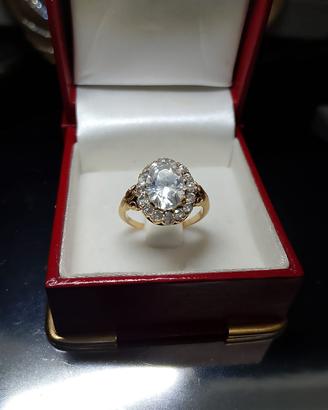 anello 18k con diamanti e zaffiro bianco 
