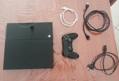 PS4 modello "FAT" con controller e 2 giochi 