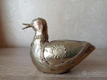 Scultura animale in metallo argentato 