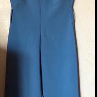 Tuta smanicata con cintura colore celeste chiaro