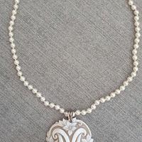 iniziale in cammeo sardonico