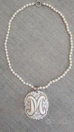 iniziale in cammeo sardonico