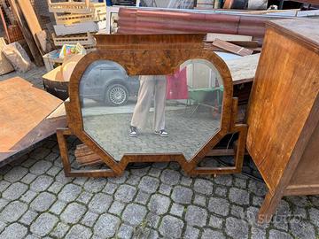 Specchio con cornice il legno