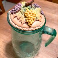 Caraffa vintage in vetro con tappo.