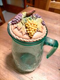 Caraffa vintage in vetro con tappo.