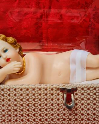 Statuetta di Gesù Bambino in cera con carillon