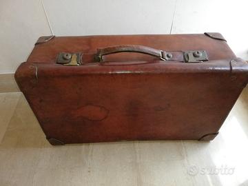 Valigia cuoio vintage per spider