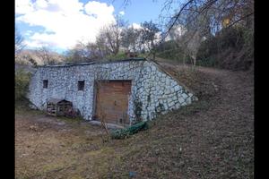 Terreno con deposito