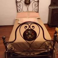 Letto ferro battuto con decori (solo testiere)