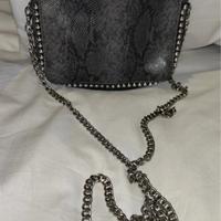 borsetta serpentata con catenella argento
