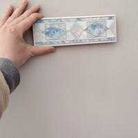 listelli cornice muro