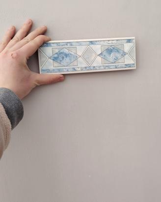 listelli cornice muro