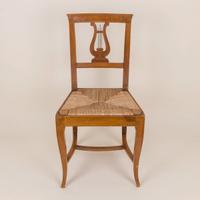 Sedia paglia vintage con decorazione lira