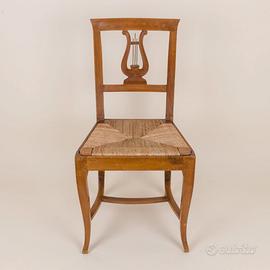 Sedia paglia vintage con decorazione lira