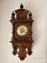 Orologio a pendolo da parete in legno massello