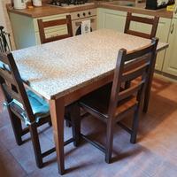 Tavolo con top truciolato allungabile + sedie 