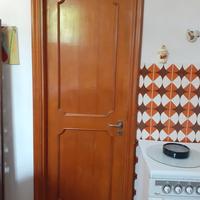 Porte interne in legno di noce tanganica