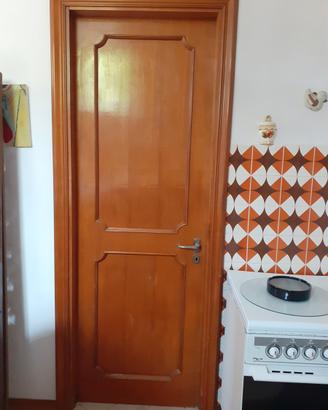Porte interne in legno di noce tanganica