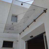 Pensilina - Lucernario in vetro per porta