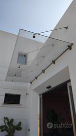 Pensilina - Lucernario in vetro per porta