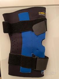 Ginocchiera con aste e stabilizzatore rotuelo