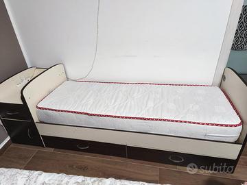 Culla basculante trasformabile in letto