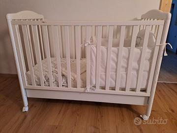 Lettino con corredo completo