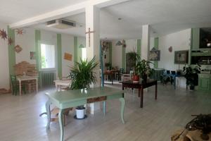 Ristorante pizzeria con vista lago