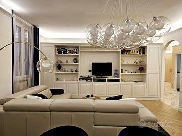 libreria con porta tv laccata ante e vani giorno