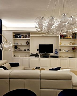 libreria con porta tv laccata ante e vani giorno