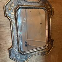 Specchio vintage con cornice decorata