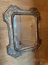 Specchio vintage con cornice decorata