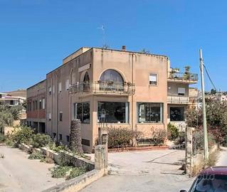 COMPLESSO IMMOBILIARE POLIFUNZIONALE 1740 mq