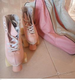Pattini a rotelle colore rosa con borsa