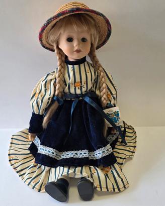 Bambola MagicSun in porcellana con vestito blu