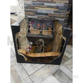 MODELLINO DIORAMA CON GROTTA GUERRIERI E SOLDATO