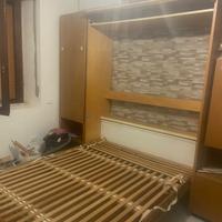 letto a scomparsa  con tavolo e armadio