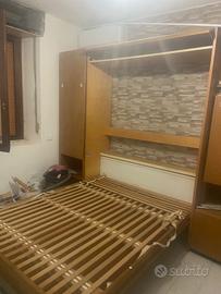 letto a scomparsa  con tavolo e armadio