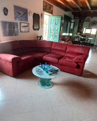 Divano ad angolo tavolino in vetro