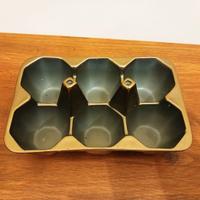 Portauova in porcellana dorata Seletti