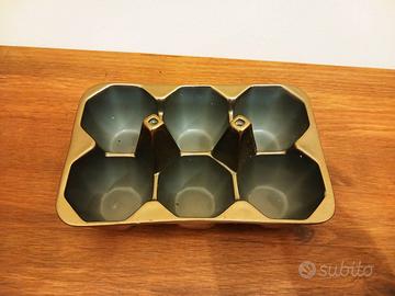 Portauova in porcellana dorata Seletti