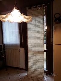 tenda con nappine