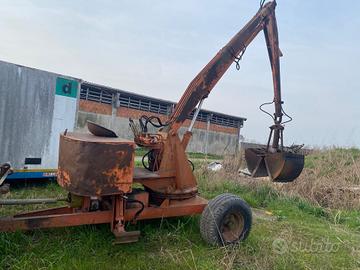 Trattore carica letame