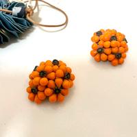 Orecchìni vintage arancio in buone condizioni