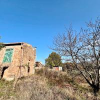 Poli: rustico bifamiliare con terreno