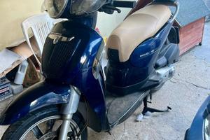 Scarabeo 200 light leggere tutto