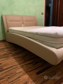 Letto piazza e mezza ecopelle effetto sospeso