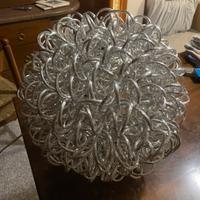 Lampada  intrecciata in metallo